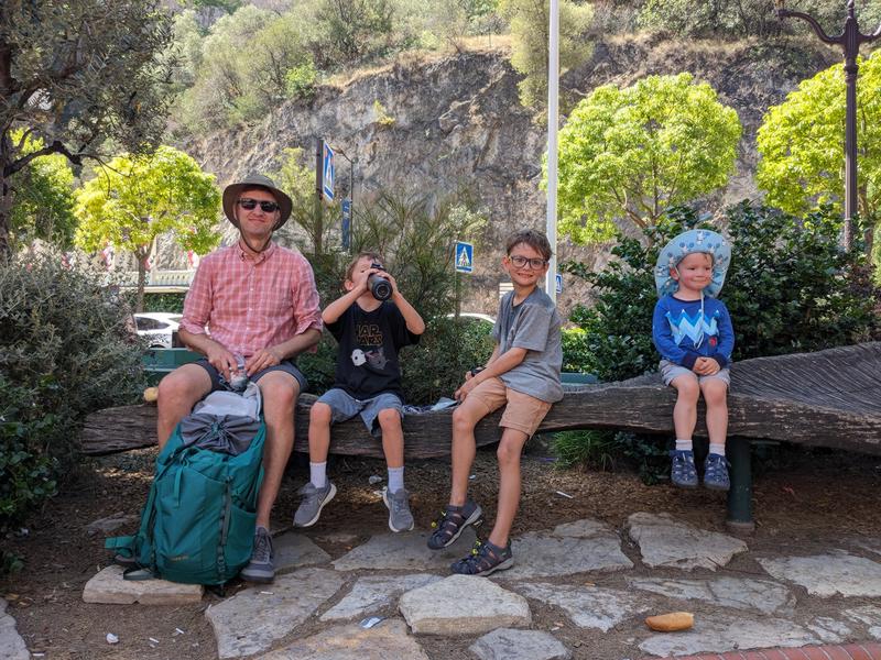 Finding shade in the heat, with a little bread and nutella.