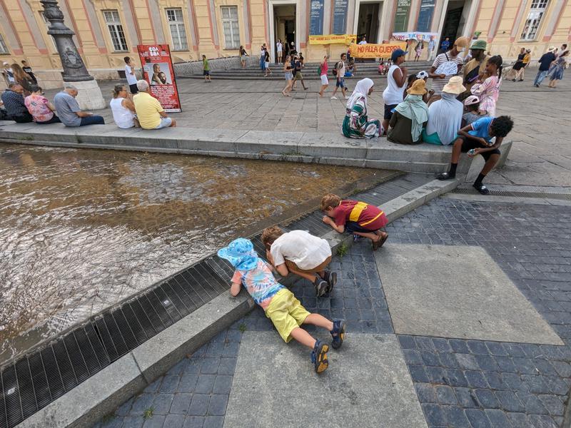 Kids looking at where the fountain goes