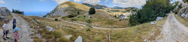 Kids, sea, and mountains