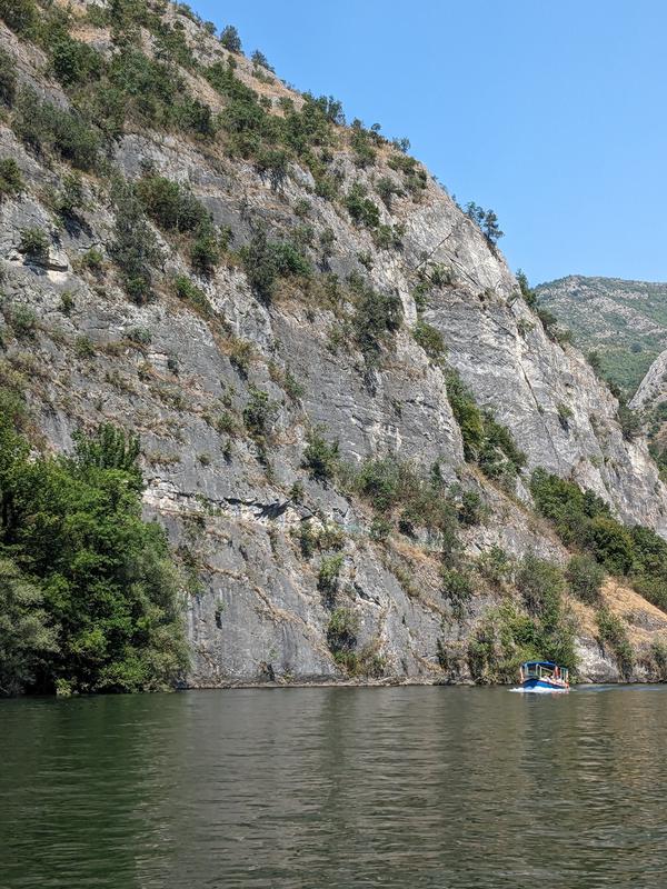 A boat under the cliffside hiking trail we had taken out