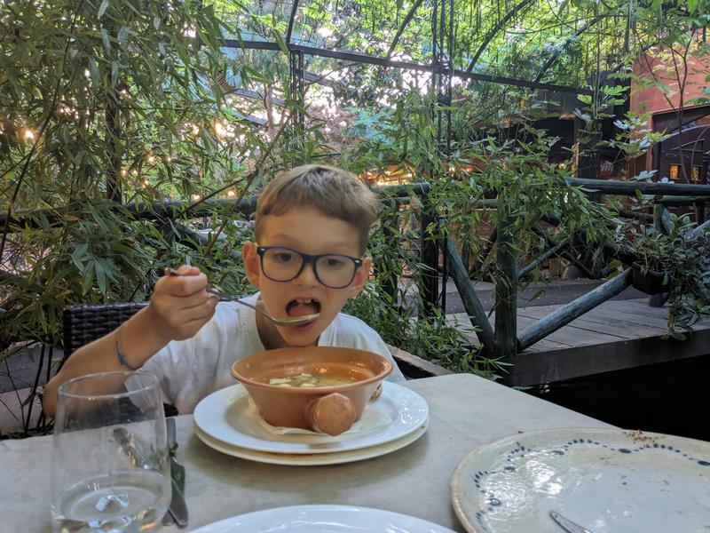 Ben digging in to the fish soup.