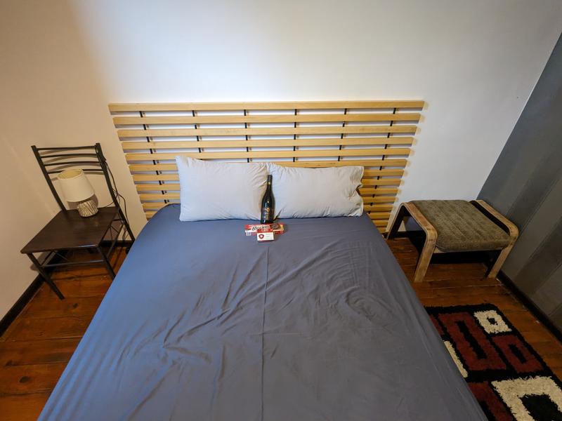 We prepared our friends' bed for their arrival...with extra "horny goat"