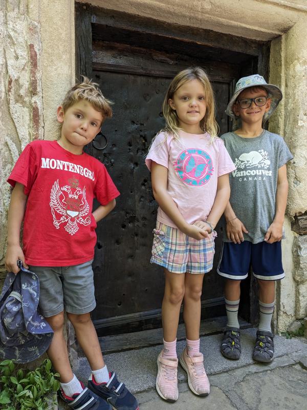 The kids were very interested in the door.