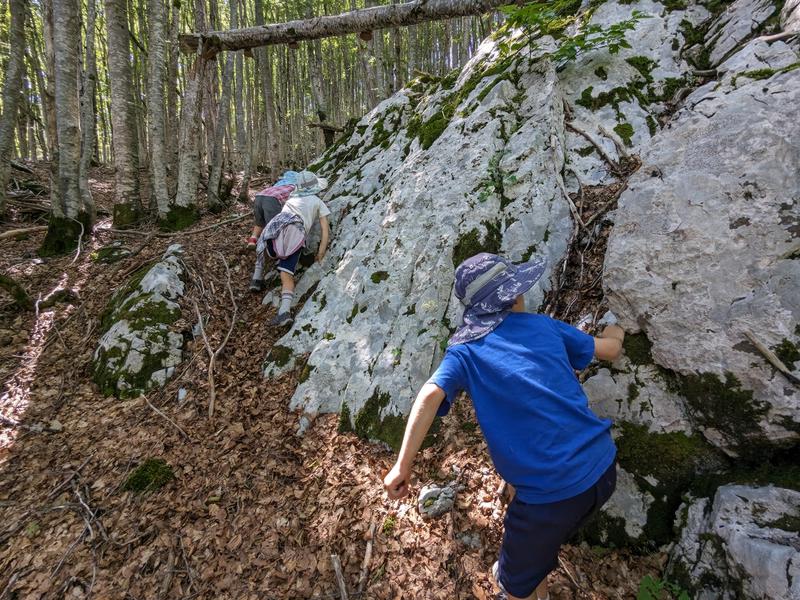 Scrambling back from the cave