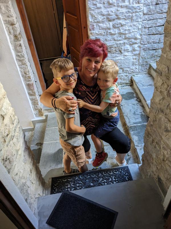 One of the hotel's hosts with the kids