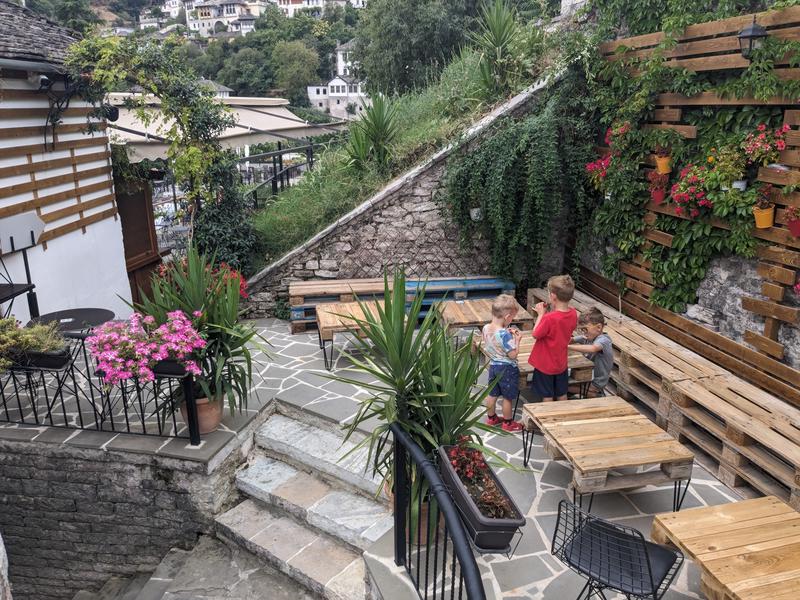 Kids sharing fruit on the terrace