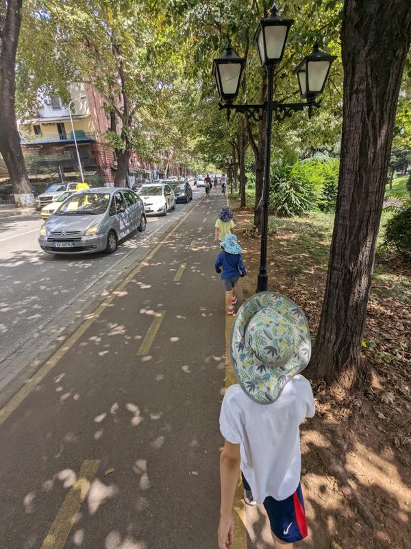 Walking single file along the bike path