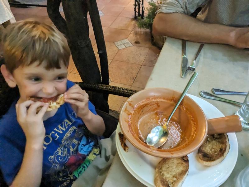 Sammy destroying the pizza and tomato soup