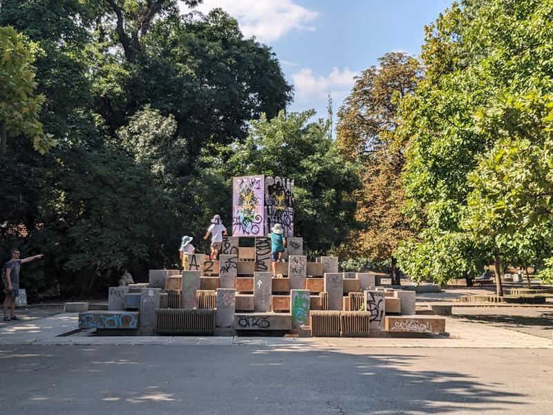 Playing on the sculptures in the park
